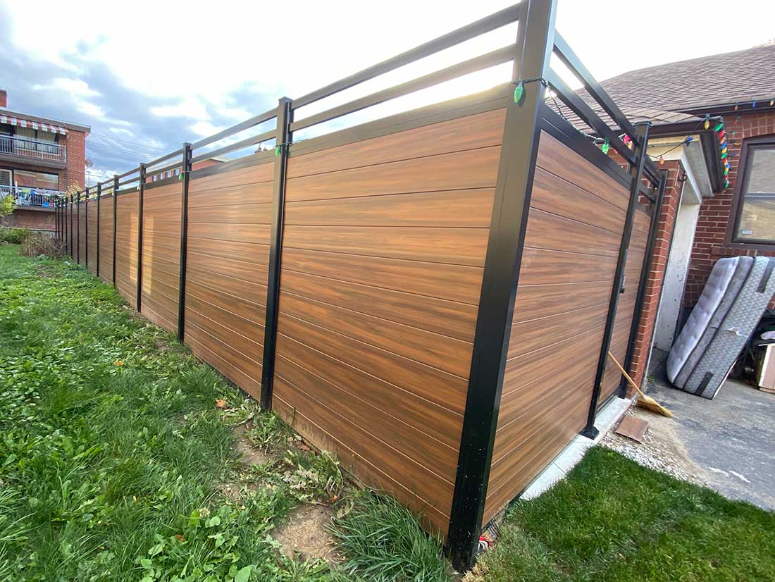 Wood Grain Vinyl Fence Panels-Wood Grain Vinyl Fence Panels installed in Burlington